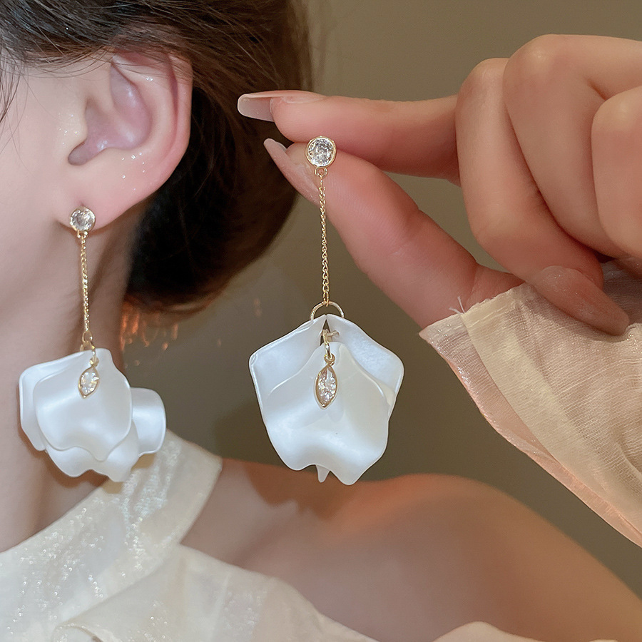 Pendientes de flor de lazo elegante de súper hada de plata Pendientes de moda de lujo ligero francés Pendientes de todo fósforo dulce de estilo literario