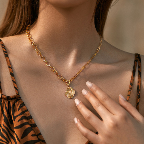 Gold-plated neutral European and American heavy metal chain lockets with small gold balls, irregular retro necklace