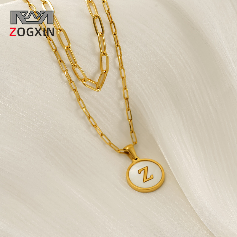Transfronterizos de moda europea y americana de doble concha collar de acero inoxidable chapado en oro redondo 26 letras inglesas colgante collar mujer