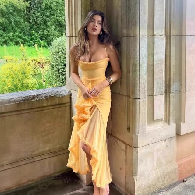European and American Early Spring 2024 Women's New Fashion High-End Design Hollow-Out Solid Color Asymmetrical Slit Strap Dress European and American Early Spring 2024 Women's New Fashion High-End Design Hollow-Out Solid Color Asymmetrical Slit Strap Dress