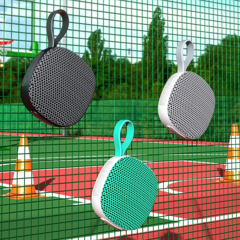 Nuevo altavoz Bluetooth inalámbrico transfronterizo portátil tela impermeable mini subwoofer tarjeta magnética pequeño sonido