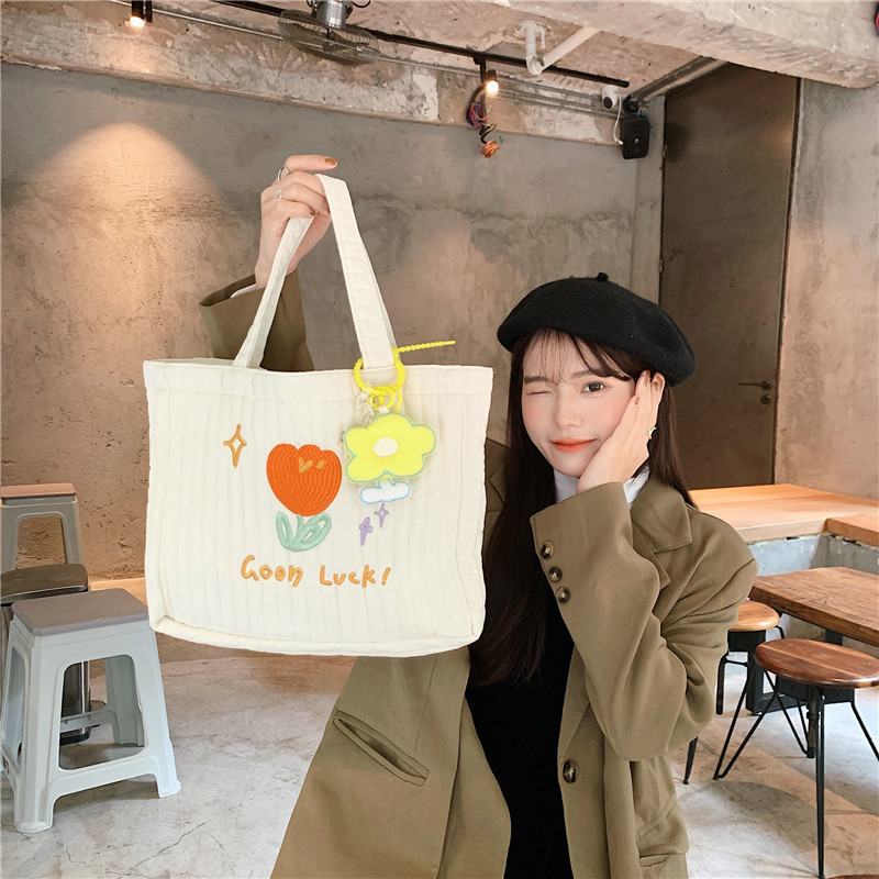 112291 Fresh and delicate quilted embroidered tote bag, a canvas bag for female students' classes, a simple and artistic shopping bag undefined