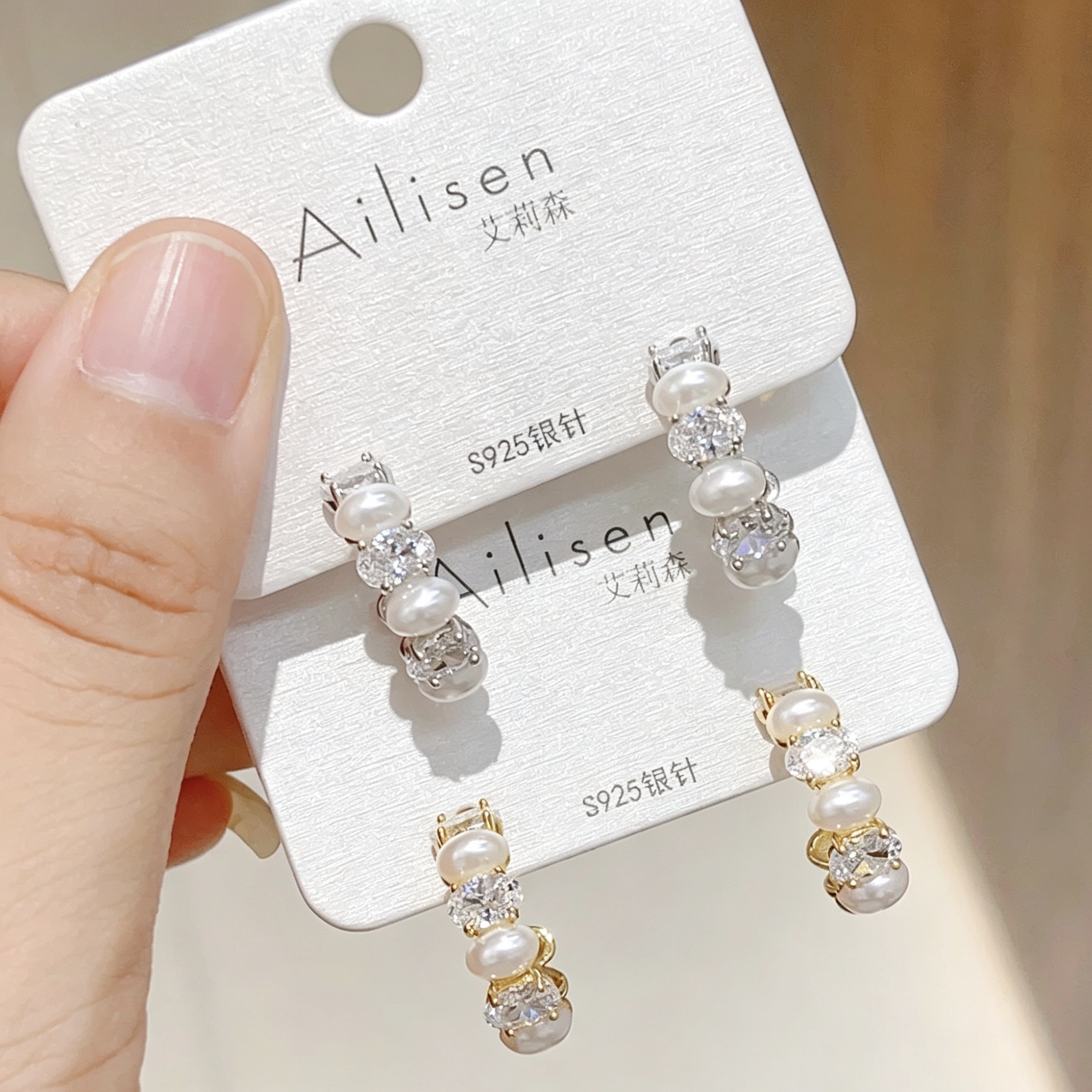 S925 silver needle pearl and cubic zirconia C-shaped hoop earrings, French-style luxury earrings for women, wholesale from a niche jewelry manufacturer