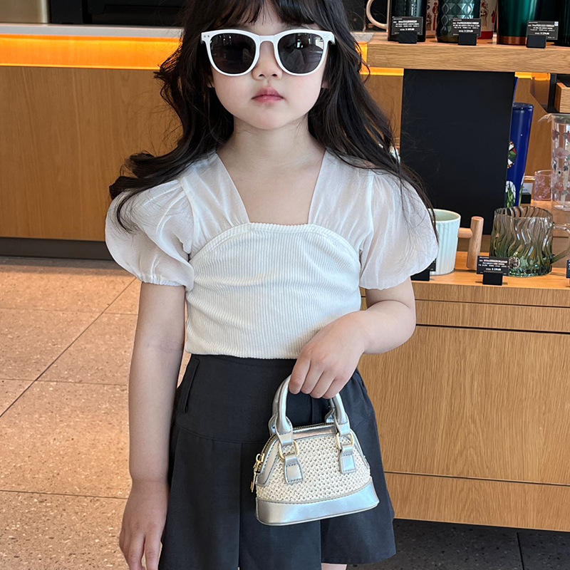 Bolso de hombro para niños y niñas de color de contraste de moda coreana, mini bolso de bebé tejido de paja de estilo occidental, nuevo bolso de mensajero para niños