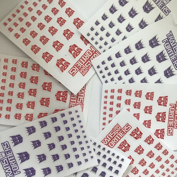 Customized Ready-Made Transformers Toy Logo Sticker Decepticon Qin Tianzhu Transfer Sticker Uv Tear-Off Film Label