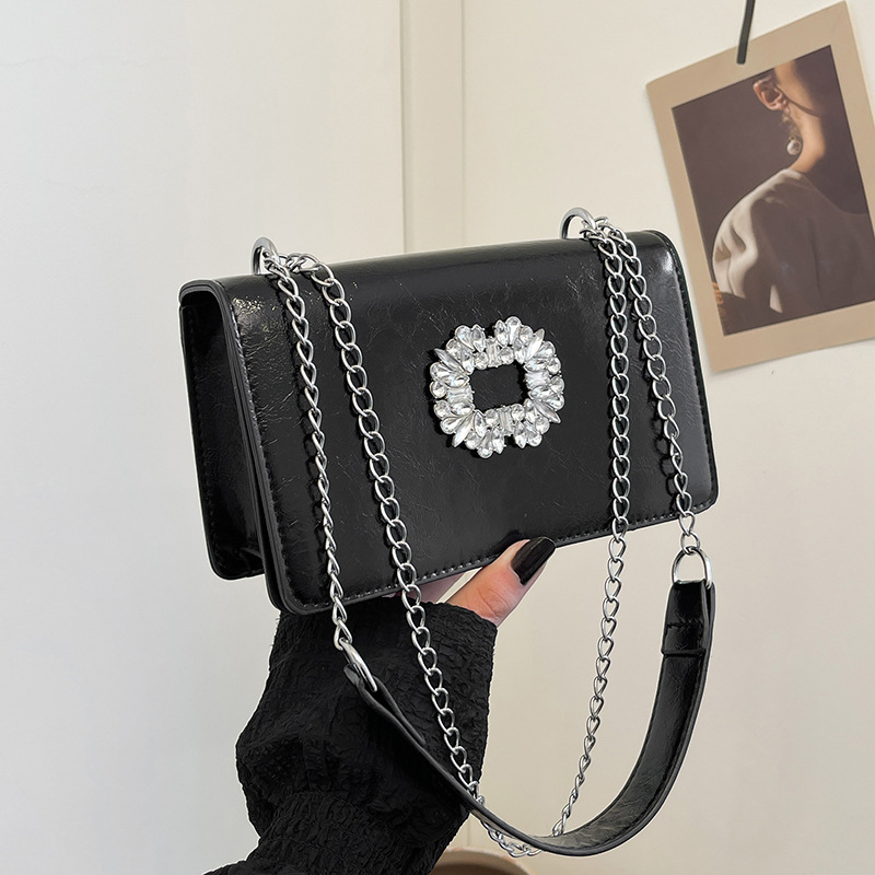 Bolsa cuadrada de diamante de alta calidad para mujeres 2024 otoño nueva moda coreana de textura universal cadena de hombro mochila