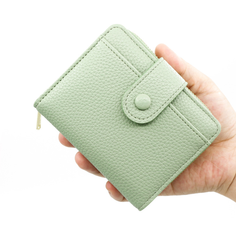 Nueva cartera transfronteriza de las mujeres simple patrón lychee cremallera monedero corto chica cartera al por mayor