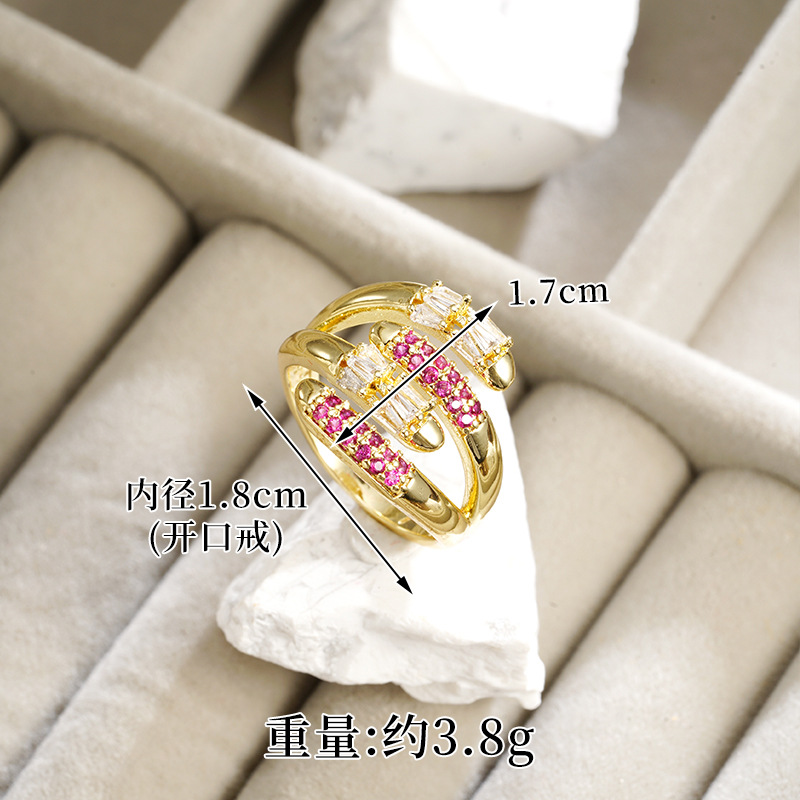 J23906 anillo de apertura ligeramente incrustado en zircon - Rosa