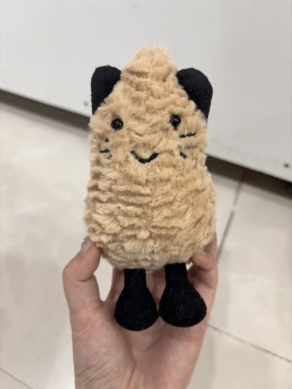 元のイギリスジェリーcatシリーズのぬいぐるみの超全合集3b斉防塵袋のバーゼル熊の手の花