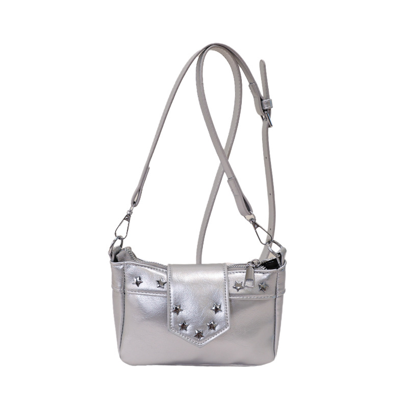 Simple retro bolso axilar 2026 nuevo bolso de remaches personales coreano en el temperamento bolso de hombro de viaje