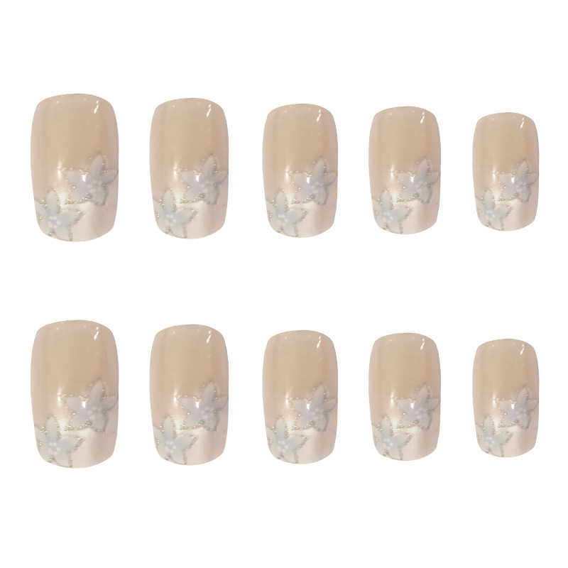 Desnudo, borde blanco, uñas francesas, flores azules, adornos dulces y exquisitos, 24 piezas de parches de uñas terminados.