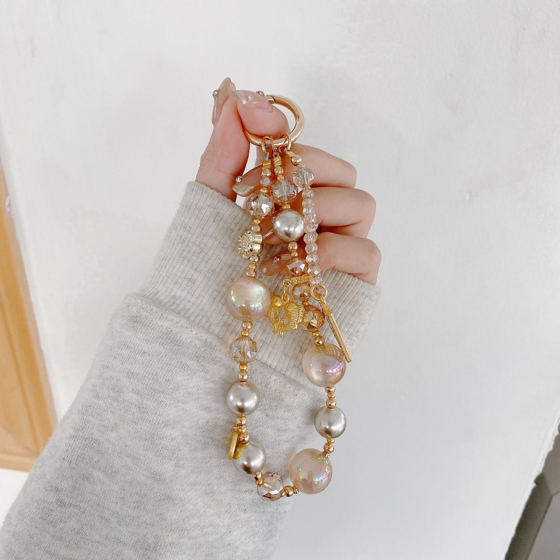 Boutique hecho a mano de alta gama cadena de teléfono móvil serie ábaco cadena larga y corta cordón de teléfono móvil de moda colgante de mensajero largo y corto