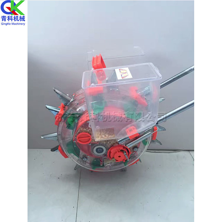 手推式滚轮播种机 小型农用梯田山坡播种机 小颗粒勺式点播机