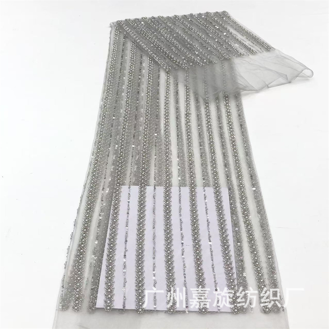 Vestido de novia de malla de encaje con textura vertical, traje de escenario, tela de lentejuelas bordada con cuentas, tela de encaje con cuentas