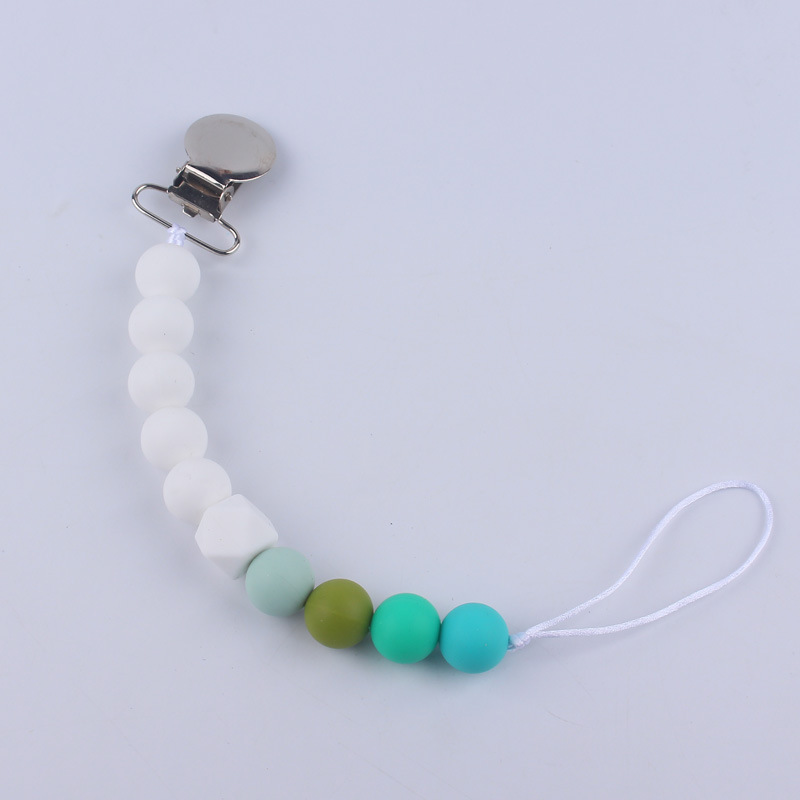 Nuevos suministros para bebés Cadena de chupete DIY creativo contraste color cuentas de silicona mordedor anti-caída traje de cadena