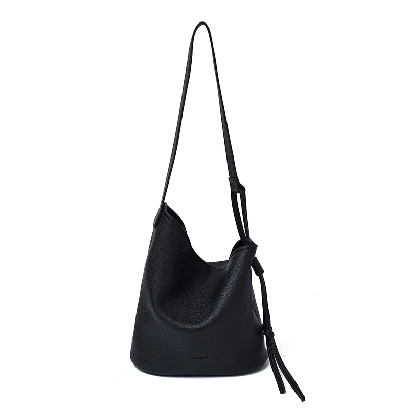Bolso de cubo de textura transfronteriza 2025 verano nuevo bolso femenino estilo ins bolso de hombro simple