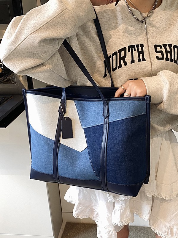 Nicho de diseño de bolso de hombro para mujeres 2026 nueva moda transfronteriza bolso de transporte de moda retro bolso de brazo