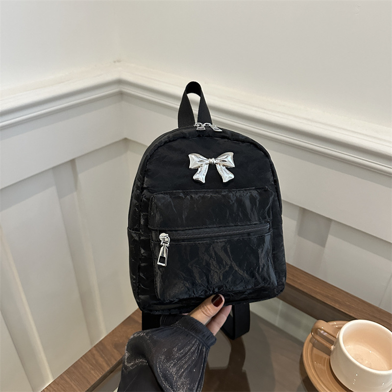 Mochila de arco para mujeres, estilo de estilo casual, moda coreana, mochila de balde, mochila de viaje pequeña y ligera