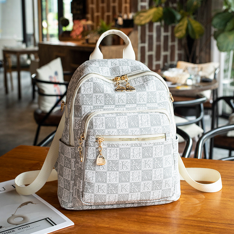 Ins celebridad de Internet mochila femenina 2024 nueva moda salvaje damas mochila de cuero suave mochila de viaje de ocio al aire libre