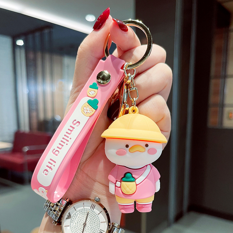 Venta directa de fábrica llavero colgante pequeño muñeca tridimensional llavero de coche mochila escolar colgante puesto al por mayor productos pequeños