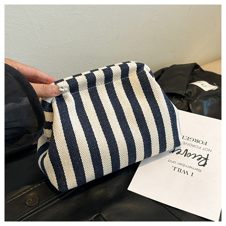 New cross-border fashion color-blocking striped cosmetic bag, women's loose change mobile phone storage bag, trendy and niche cloud clutch undefined