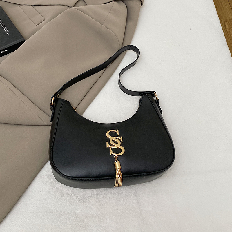 Bolso de hombro retro coreano primavera / verano 2024 nueva moda bolso de hombro de moda bolso de media luna de mujer