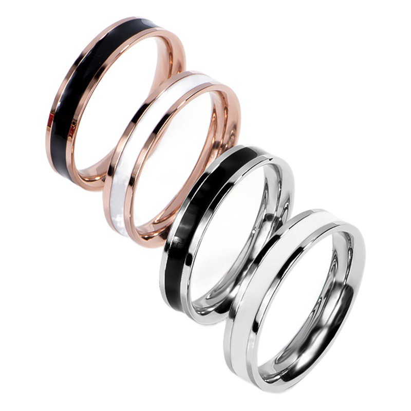 Personalidad de moda anillo de dedo índice de viento frío epoxi en blanco y negro femenino europeo y americano simple