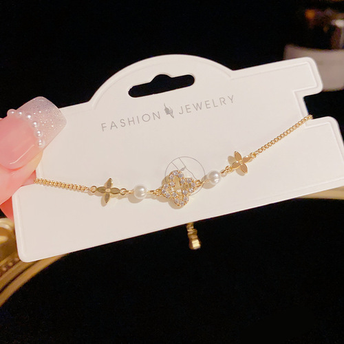 Internet celebrity style, fashionable and elegant, delicate micro-inlaid hollowed-out four-leaf clover bracelet for women, sweet and luxurious all-match bracelet