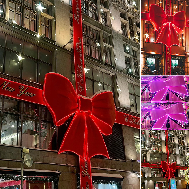 Navidad y Año Nuevo atmósfera decoración de arco luminoso gigante en la puerta del centro comercial arco supergrande