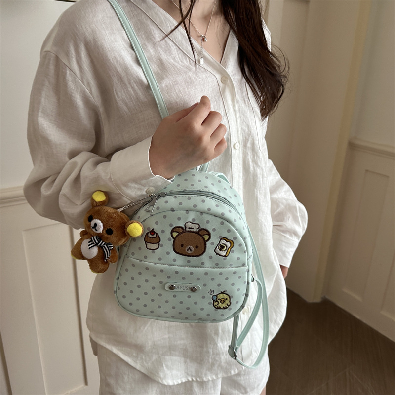 Nuevo lindo nicho de diseño ondulado punto mochila tendencia ocio femenina 2026 estilo extranjero viaje viaje mochila pequeña