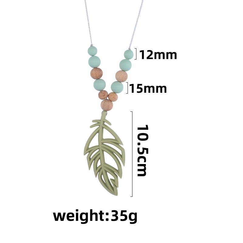 Nuevo bebé suministros silicona hoja mordedor collar fábrica directa pluma collar bebé calmante mordedor palo