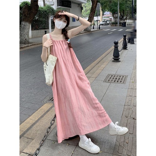 Vacation-style pink spaghetti strap dress for women, 2024 summer, loose and casual, flattering A-line midi dress