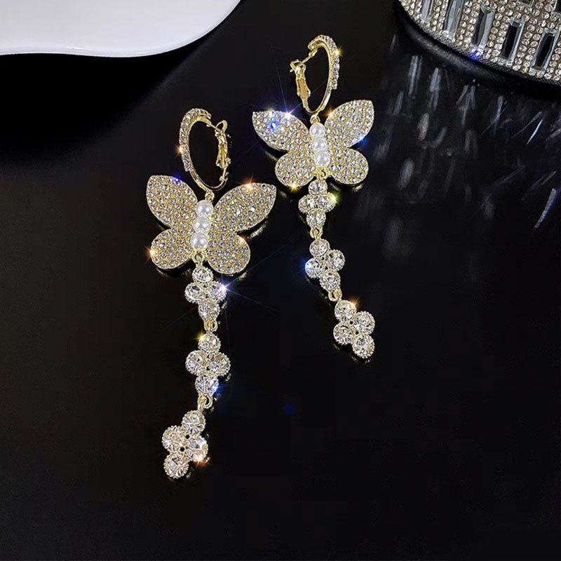 1 Pair Ig Style Shiny Butterfly Inlay Alloy Rhinestones Pearl Drop Earrings display picture 3