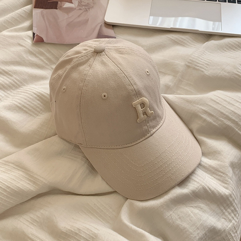 Gorra de béisbol estilo coreano circunferencia de la cabeza grande cara-mirando pequeño sombrero hombres y mujeres pareja moda todo partido letra R gorra al por mayor