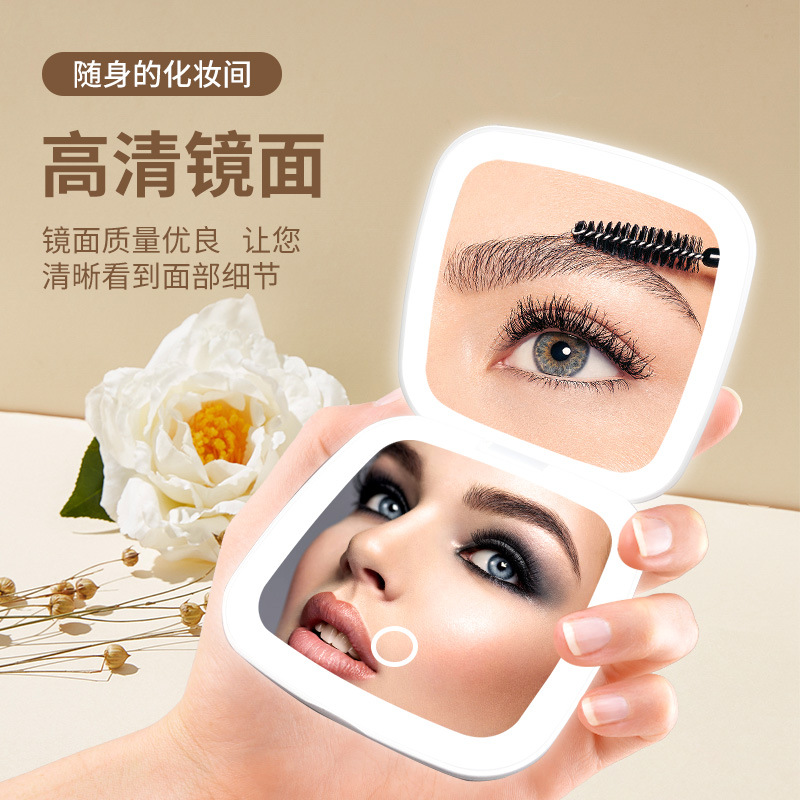 Diseño de fábrica regalo pequeño espejo Amazon LED espejo de maquillaje con luz Flip portátil de mano pequeño espejo logo