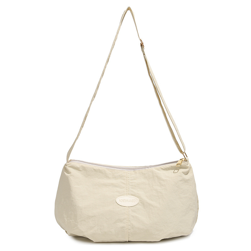 Bolso de color sólido universal 2025, nuevo bolso de bolsas de bolsas de bolsas de moda de hombro, mochila de viaje casual para hombres y mujeres.