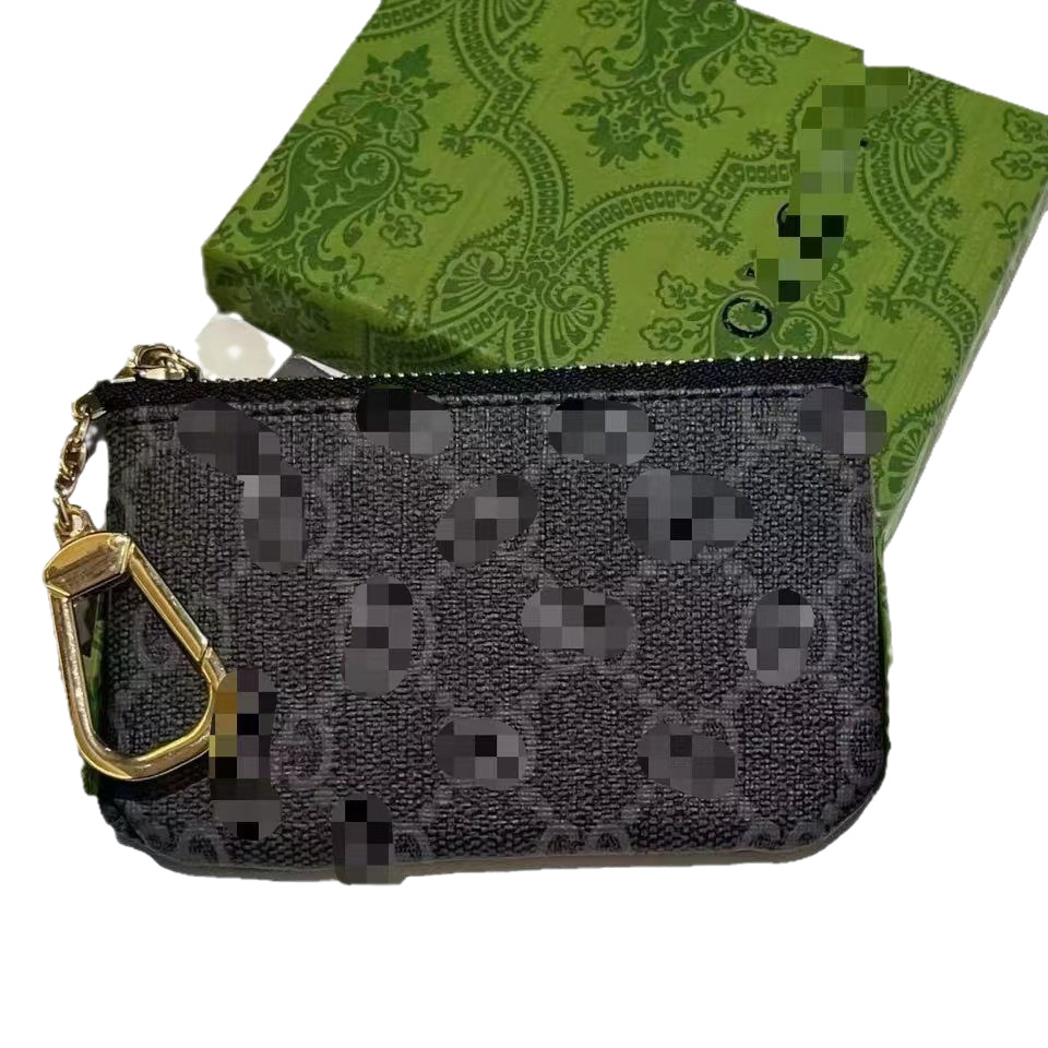 Fabricantes lotes de bolsas de cambio bolsas de lápiz labial bolsas de llaves colgantes bolsas de tarjetas de moda europeas y estadounidenses colgantes abejas GG