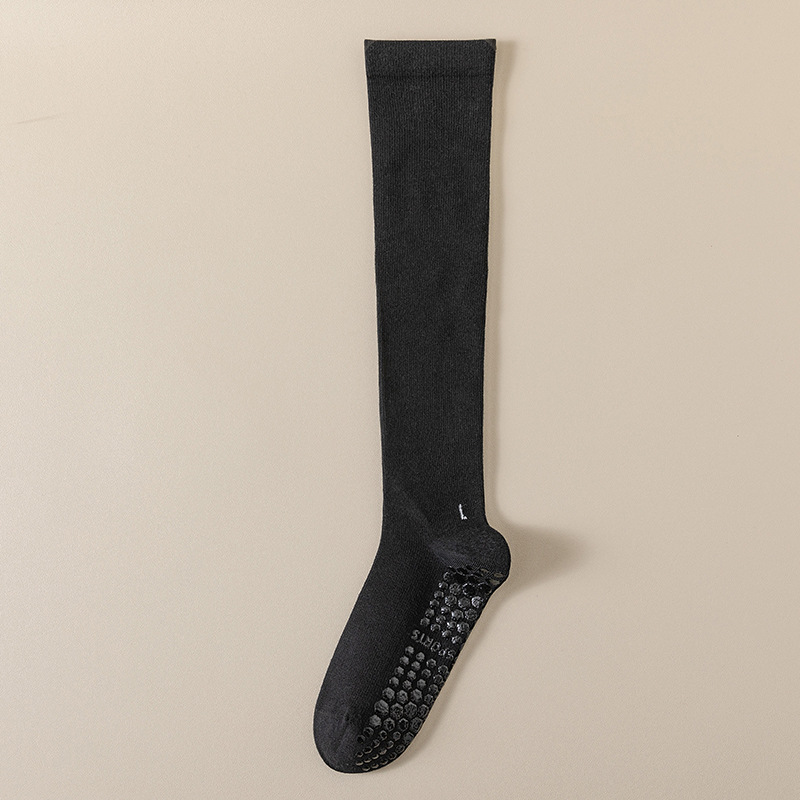 圧力の靴下の子供のヨガの靴下の高い筒の綿の純色のふくらはぎの靴下の卸売りのフィットネスのダンスの滑り止めのプラティのストッキング