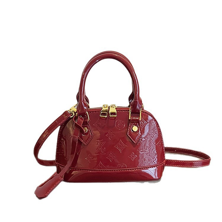 Guscio con lettere in rilievo, sensazione di alta qualità, design di nicchia, semplice e casual, versatile per il pendolarismo, da donna_voghion.com