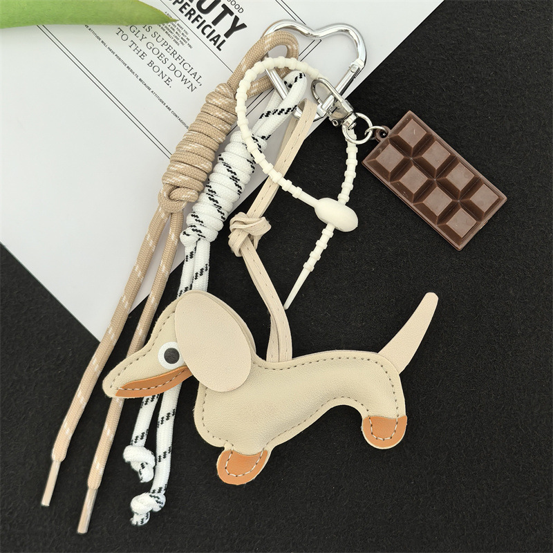 現物のソーセージ犬のストラップが可愛いルースと同じ革の子犬のバッグのストラップのカップルのキーホルダーの自動車のストラップ
