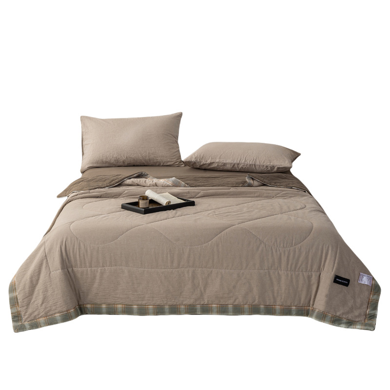 Juego de cuatro piezas de cama de edredón fresco de verano de algodón 2025 nuevo juego de tres piezas de edredón individual y doble de algodón de verano