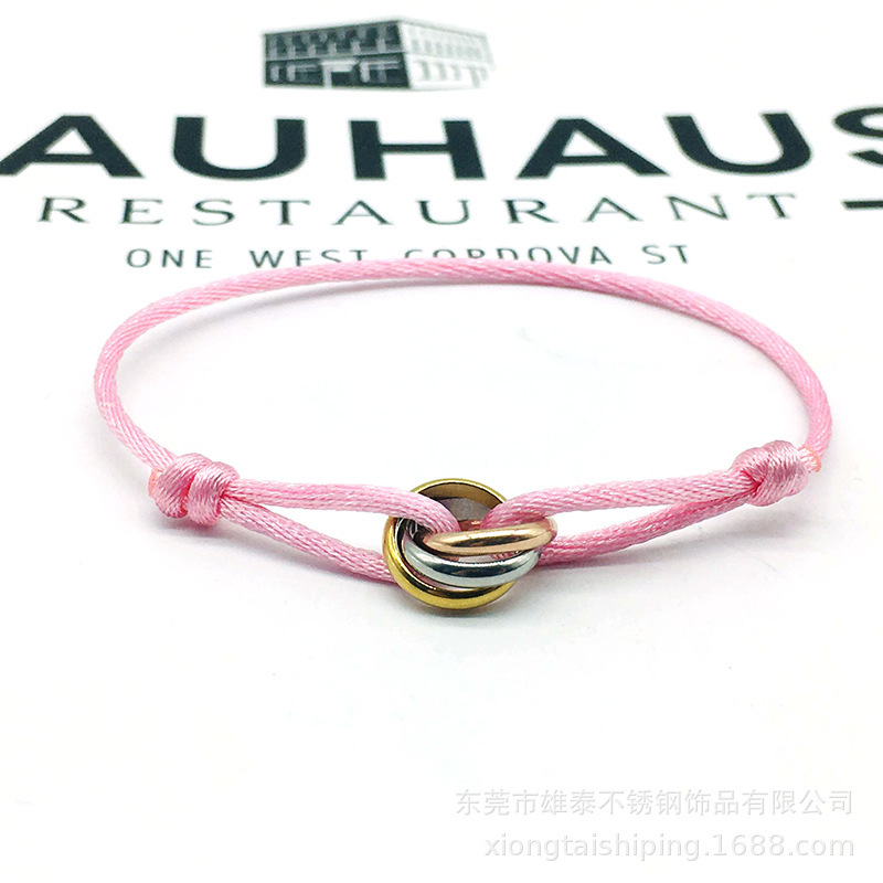 Cross-border big-name peripheral three-color circle woven lucky hand rope high-level temperament ins wind band word bracelet wholesale