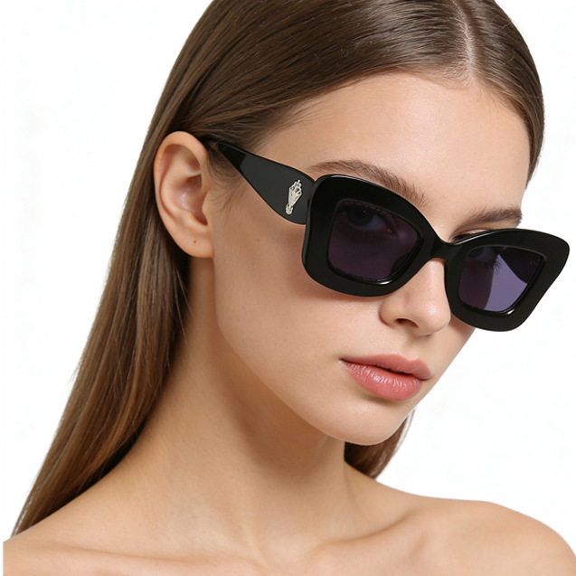 Fabricante nuevas gafas de sol transfronterizas europeas y americanas gafas de sol de ojo de gato de moda retro street shooting gafas de sol de alta gama al por mayor