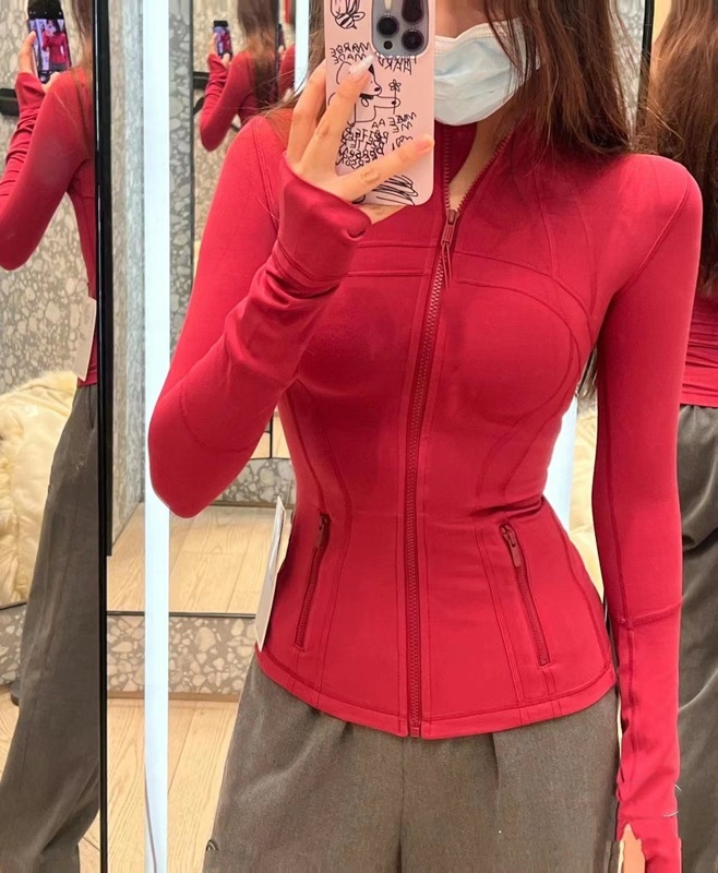 スポーツの女性の金のジッパーのシリーズのヨガの服の女性のジャケットの通気性のスポーツの上着の長袖のフィットネスの服のコート|undefined