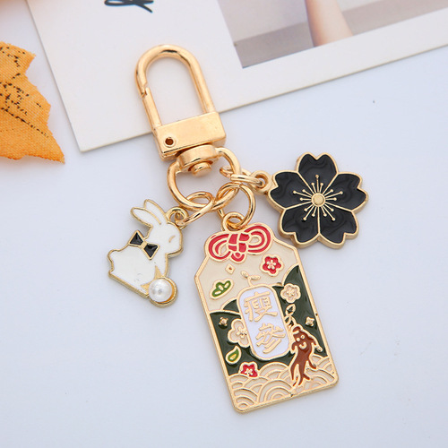Japanese ins cherry blossom peach blossom royal guard lucky and lucky creative couple keychain pendant couple bag pendant for women
