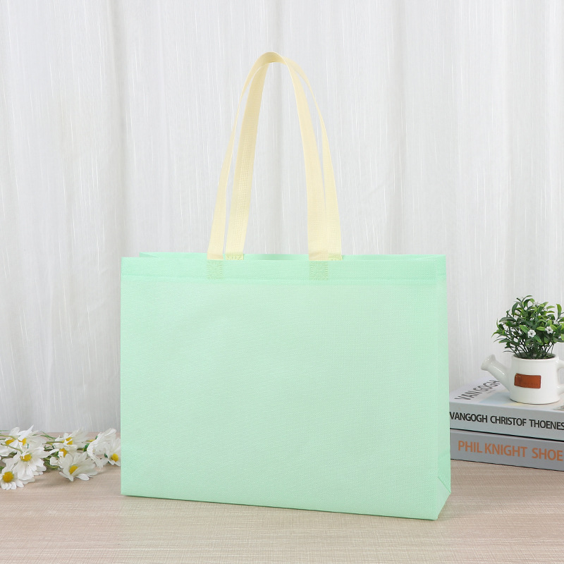 Bolsas de tela no tejida tiendas de souvenirs de viajes de madres y bebés en línea bolsa de compras de mano engrosada bolsa de mano image 4