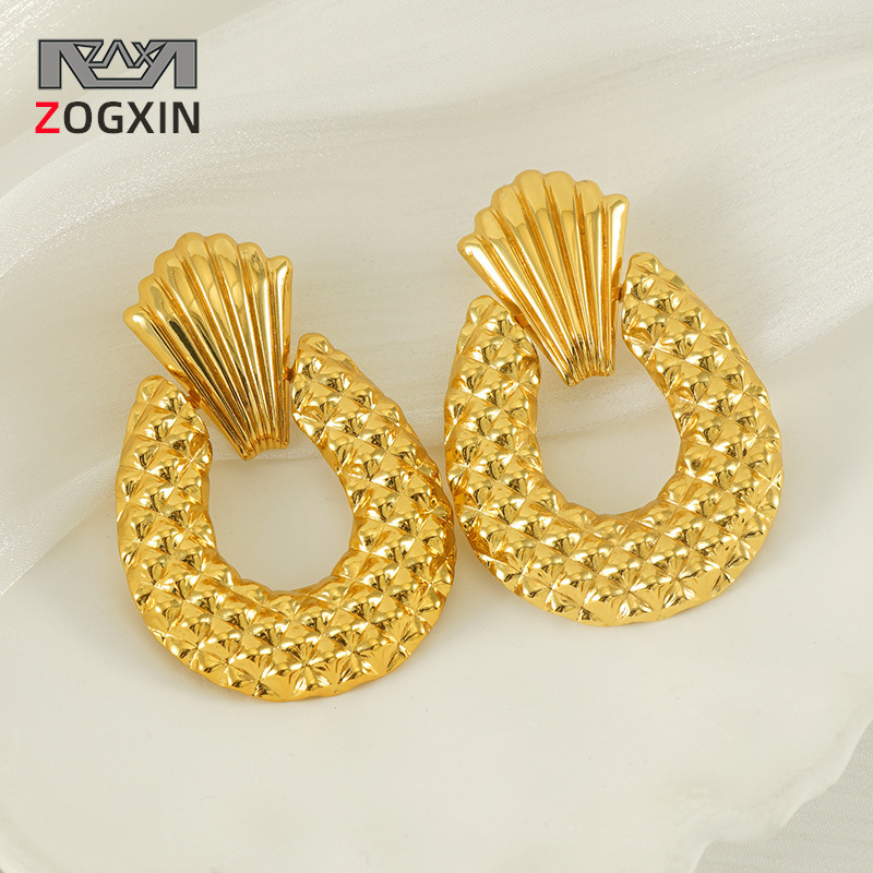 Nuevos pendientes europeos y americanos Diseño hueco creativo Pendientes de gota de agua de piña Pendientes de estilo frío de textura mate Pendientes mujeres