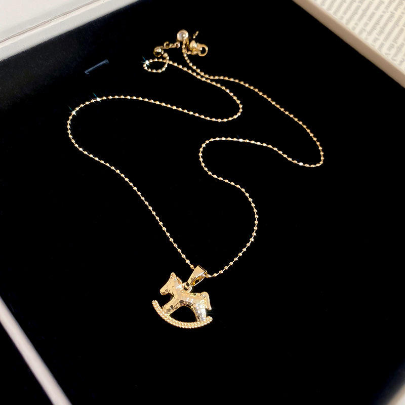 Oro verdadero eléctrico galvanis colgante de piedra pony pendientes collar ligero lujo nicho universal conjunto temperamento alta sensación de joyería mujer