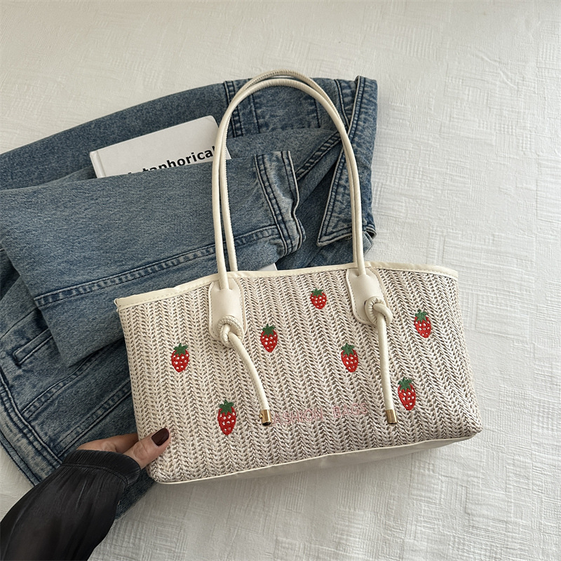 Bolsa de tejer de verano para mujeres 2024 nuevo estilo idílico vacaciones viento fresas bordado bolso de mano bolso de viaje