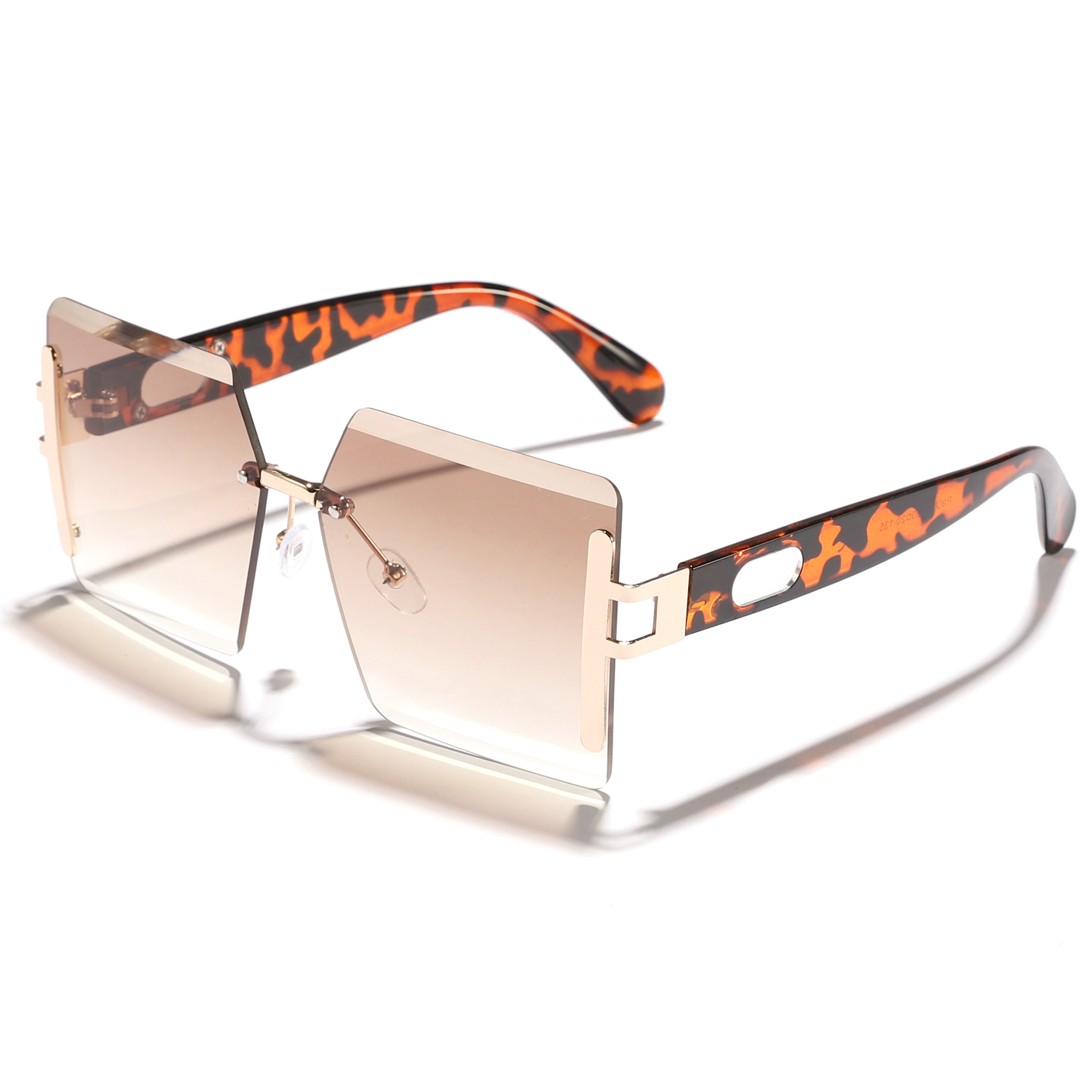 Nuevas gafas de sol cuadradas sin marco multicolores transfronterizas, gafas de sol de protección solar de pasarela de lujo ligero europeo y americano para mujeres Sunglasses
